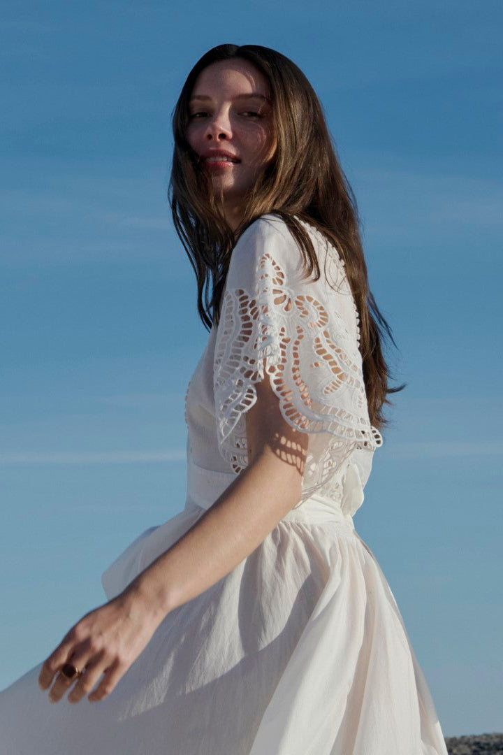 Natural white Kaftan Hina by Poupette St Barth, flowing boho-style kaftan with intricate patterns and soft fabric.