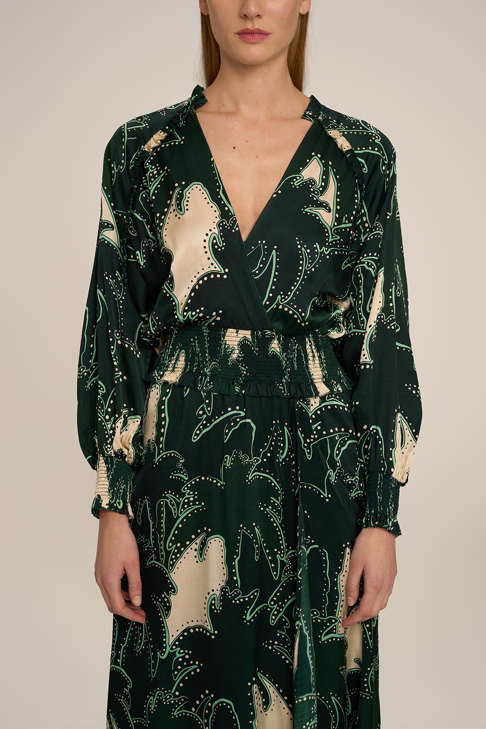 Green Kelly Long Dress by Poupette St Barth featuring a flowing silhouette and tropical palm print.