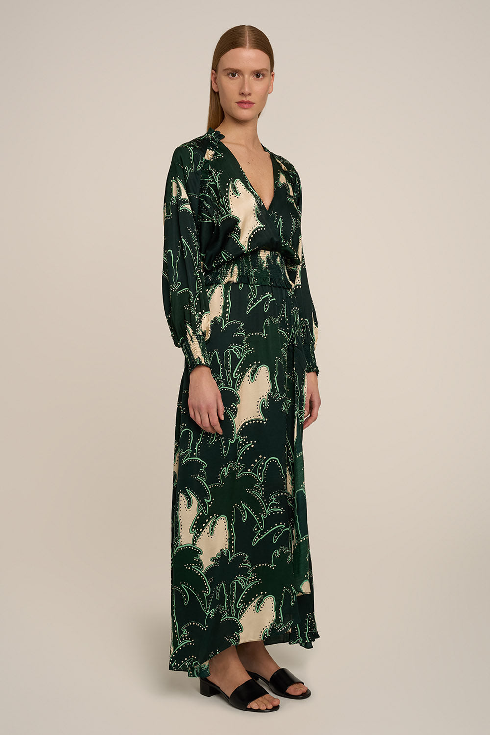 Green Kelly Long Dress by Poupette St Barth featuring a flowing silhouette and elegant design.