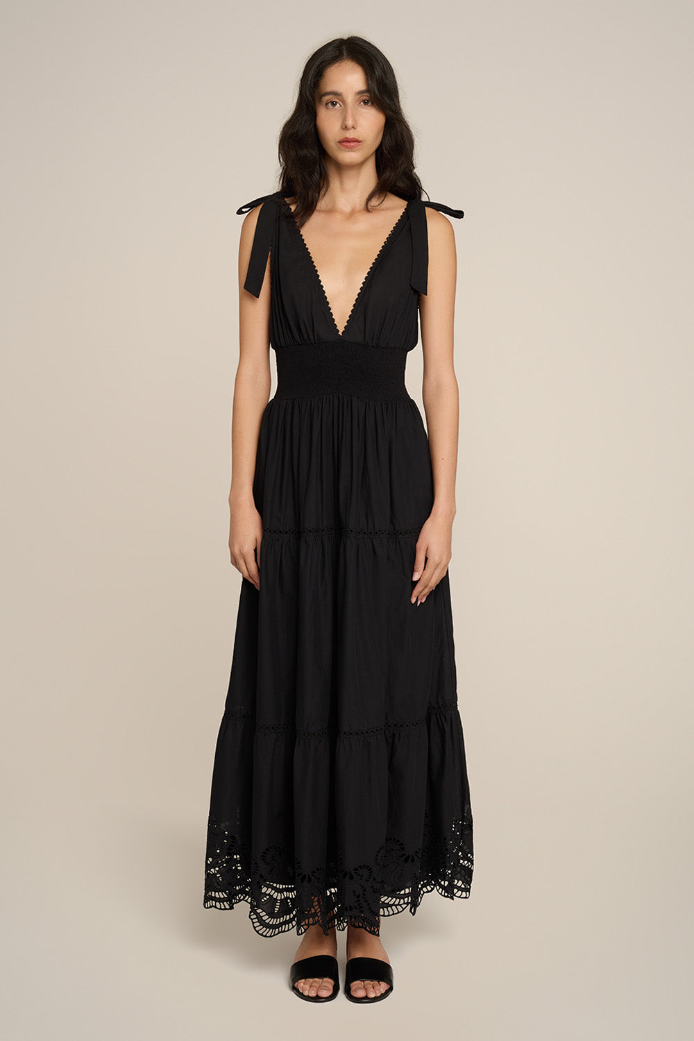 Black Long Dress Luiza by Poupette St Barth, shown front view with flowing fabric and elegant design.