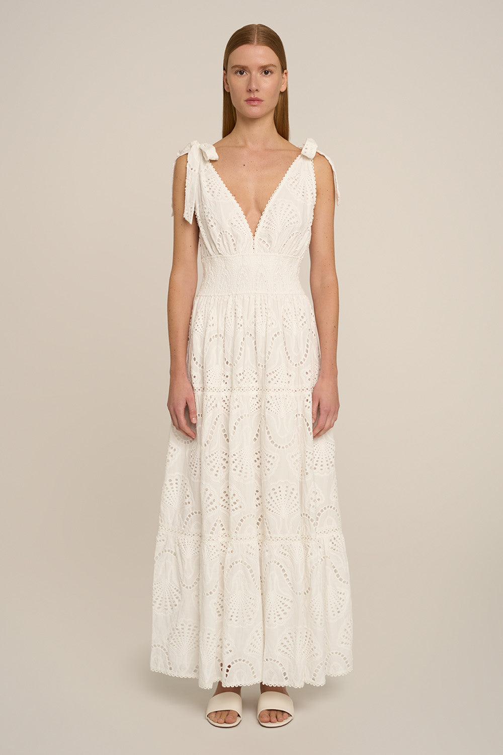 Long white Luiza long dress by Poupette St Barth, front view showing flowing fabric and elegant style.