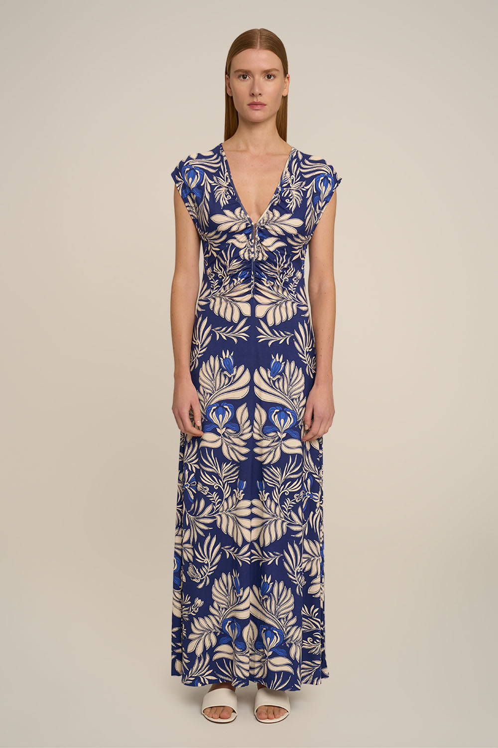 Navy long dress by Poupette St Barth, featuring a flowing silhouette and elegant design, front view of the Long Dress Nova.