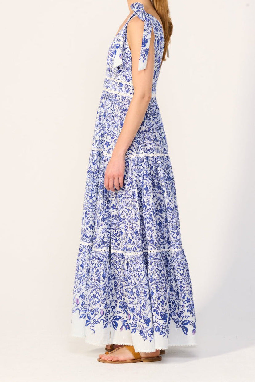 Blue long dress Perla by Poupette St Barth featuring flowing fabric and elegant design, perfect for summer or special occasions.