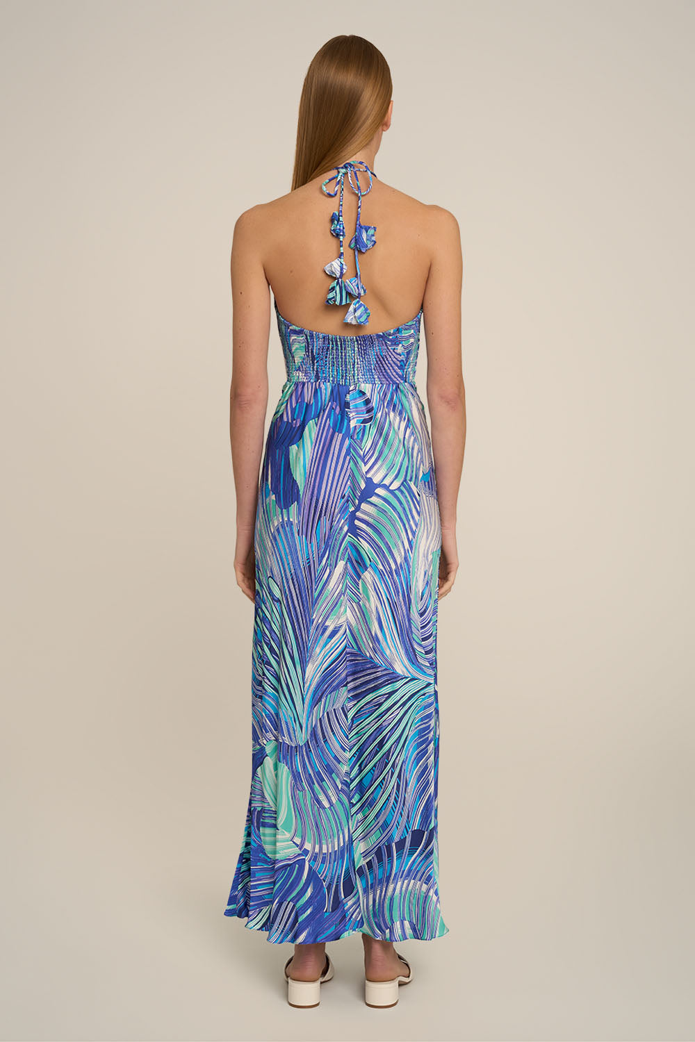 Blue Stella long dress by Poupette St Barth, shown from the back with flowing fabric and elegant design.
