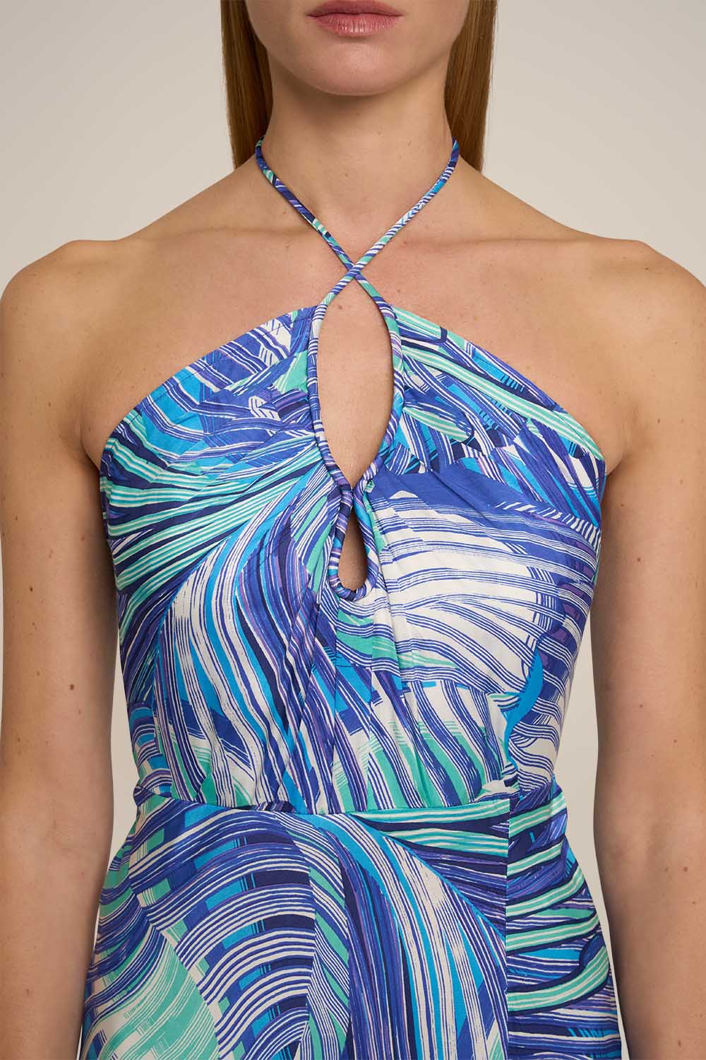 Blue Stella long dress by Poupette St Barth featuring a flowing silhouette and elegant design, shown on a model.