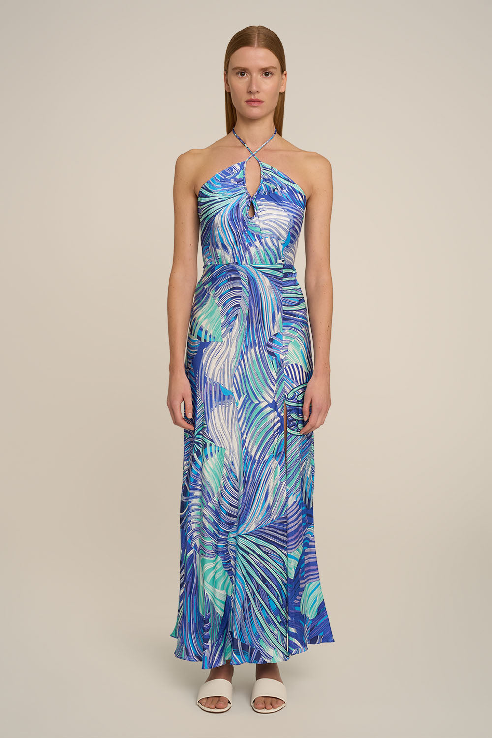 Blue Stella long dress by Poupette St Barth featuring a flowing design and elegant silhouette, shown from the front.