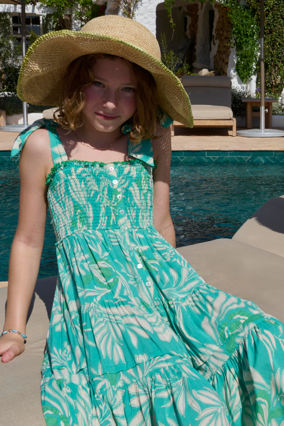 Long aqua dress for girls by Poupette St Barth, featuring a flowy, elegant design perfect for warm-weather occasions.