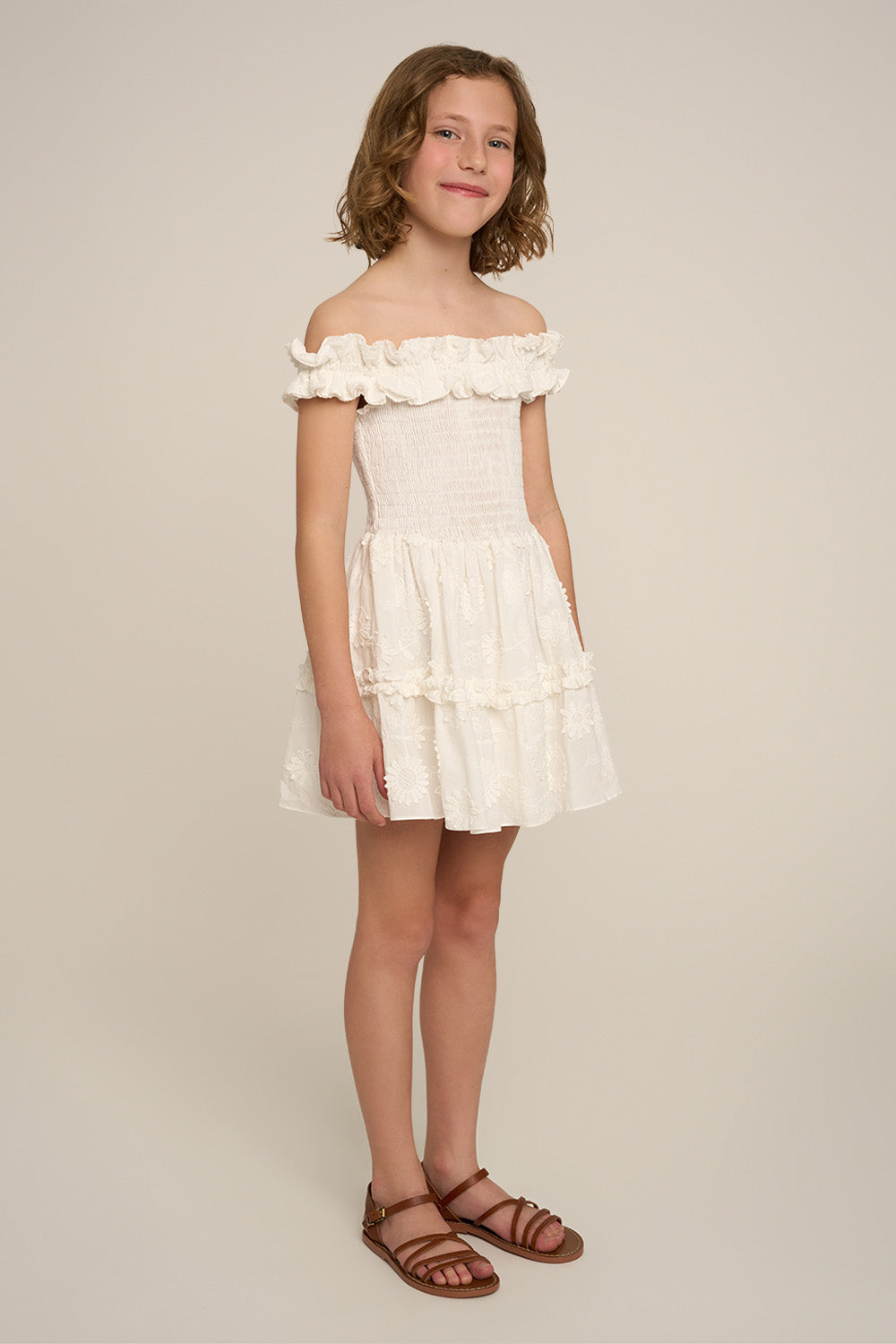 Girls' Mini Dress Amber by Poupette St Barth in natural white, showing side view of lightweight, casual mini dress for girls.