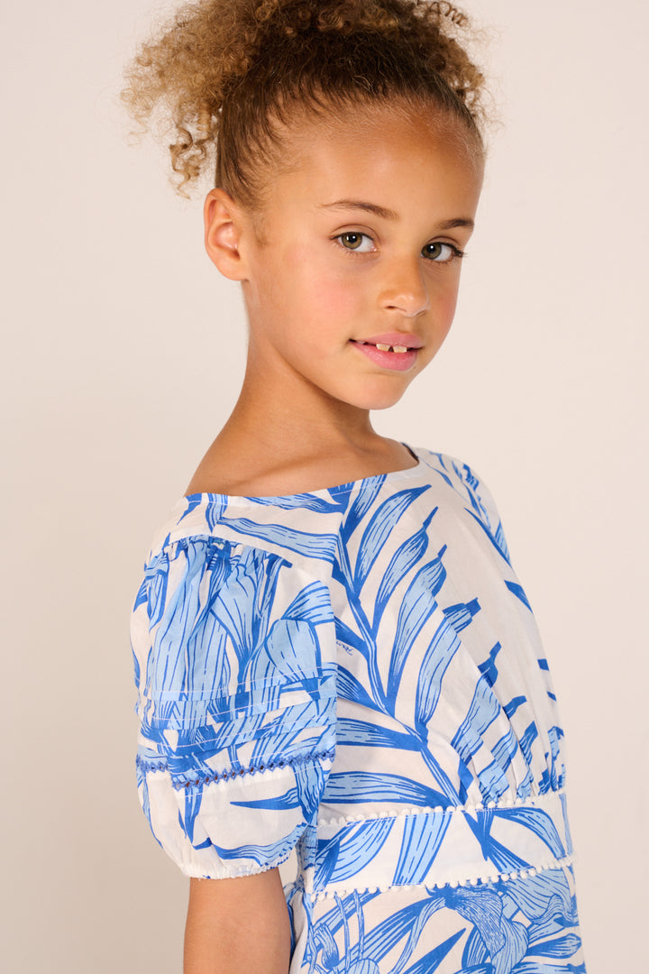 Girls' Mini Dress Chantal by Poupette St Barth in blue palm leaf print, featuring a lightweight, stylish design for warm weather.