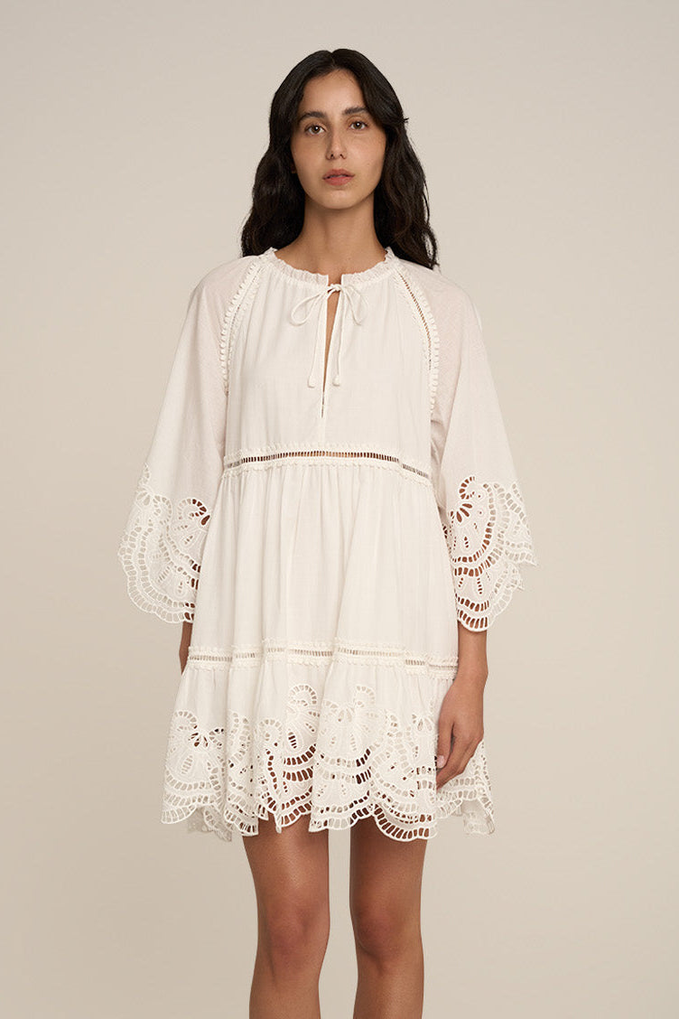 Poupette St Barth Mini Dress Mona in natural white, plain sleeveless mini dress with a fitted silhouette, front view.