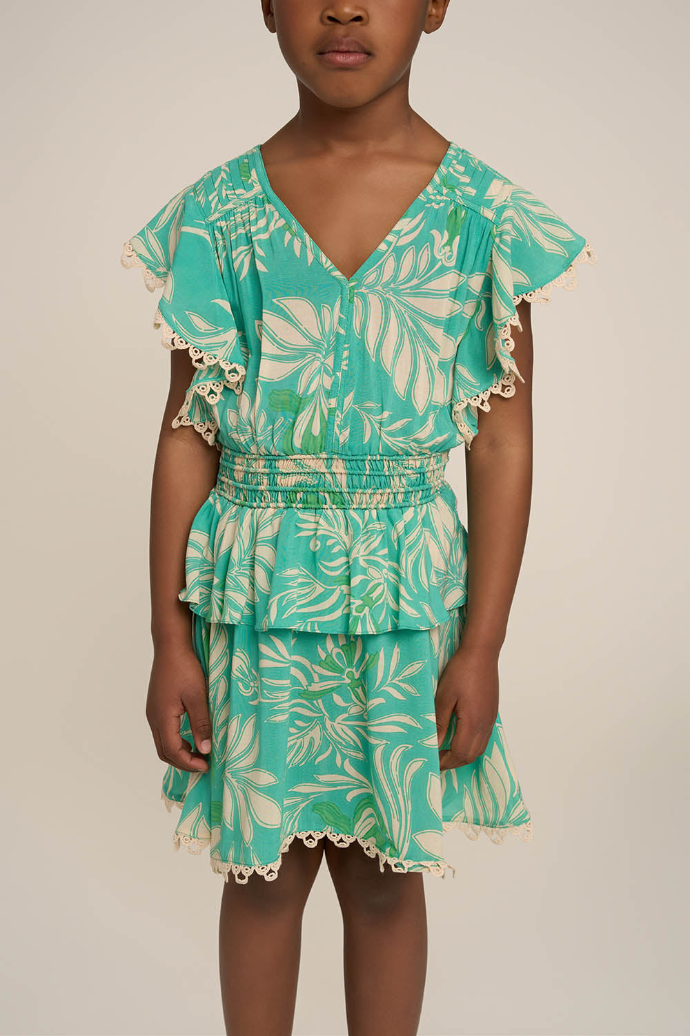 Girls' Aqua Kerylos Mini Dress Noemi by Poupette St Barth, featuring a stylish, lightweight design with floral patterns.