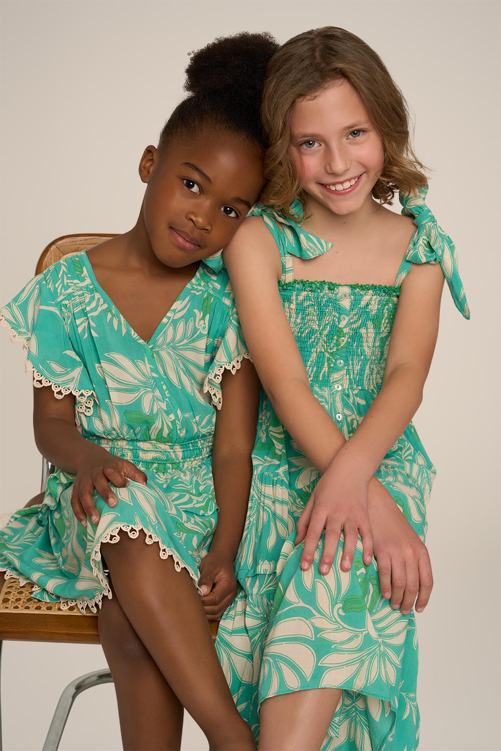 Girls' Mini Dress Noemi by Poupette St Barth in aqua Kerylos, featuring a stylish, lightweight design perfect for warm weather.