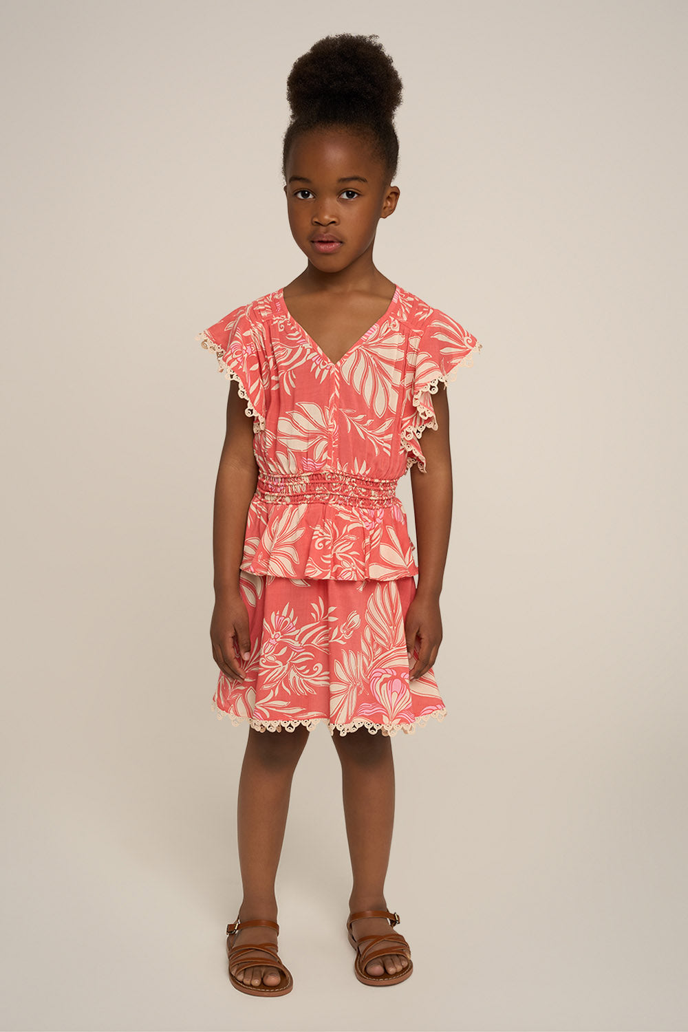 Pink Mini Dress Noemi for girls by Poupette St Barth, featuring a stylish and comfortable design with a front view.