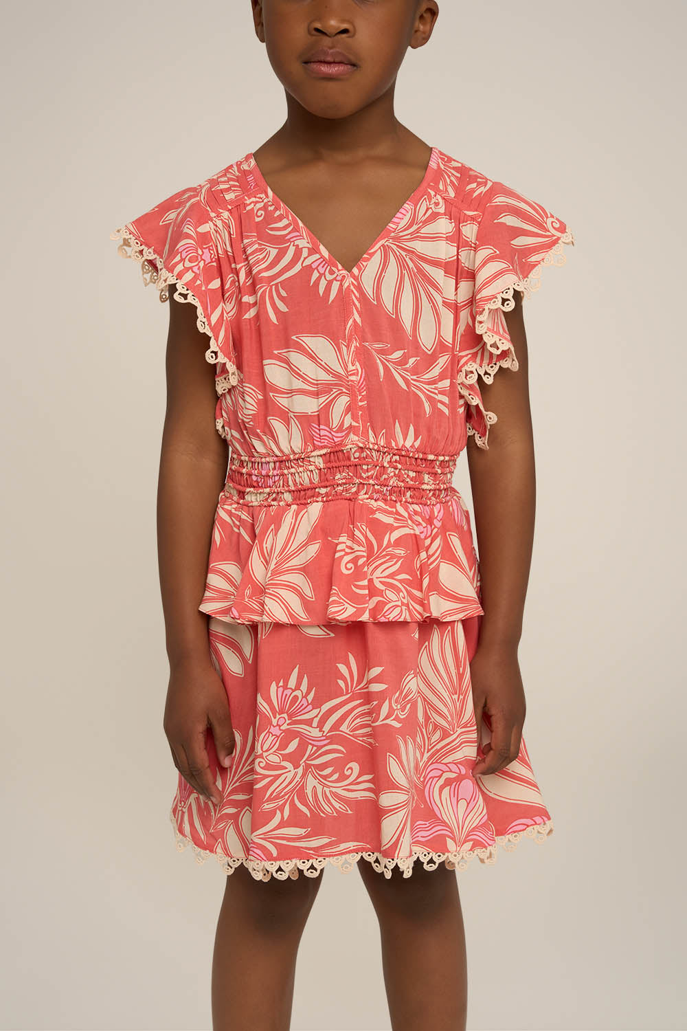 Pink Mini Dress Noemi for girls by Poupette St Barth, featuring a stylish design with a round neckline and sleeveless style.