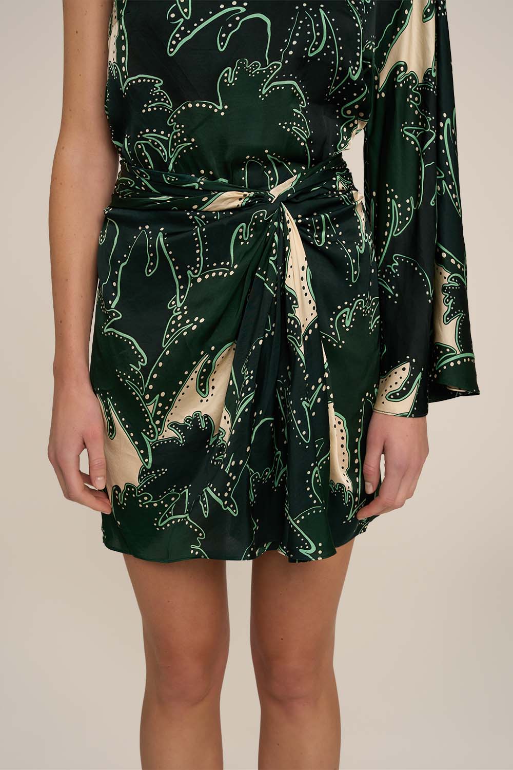 Green Mini Dress Tama by Poupette St Barth, featuring a stylish, lightweight design perfect for warm weather.