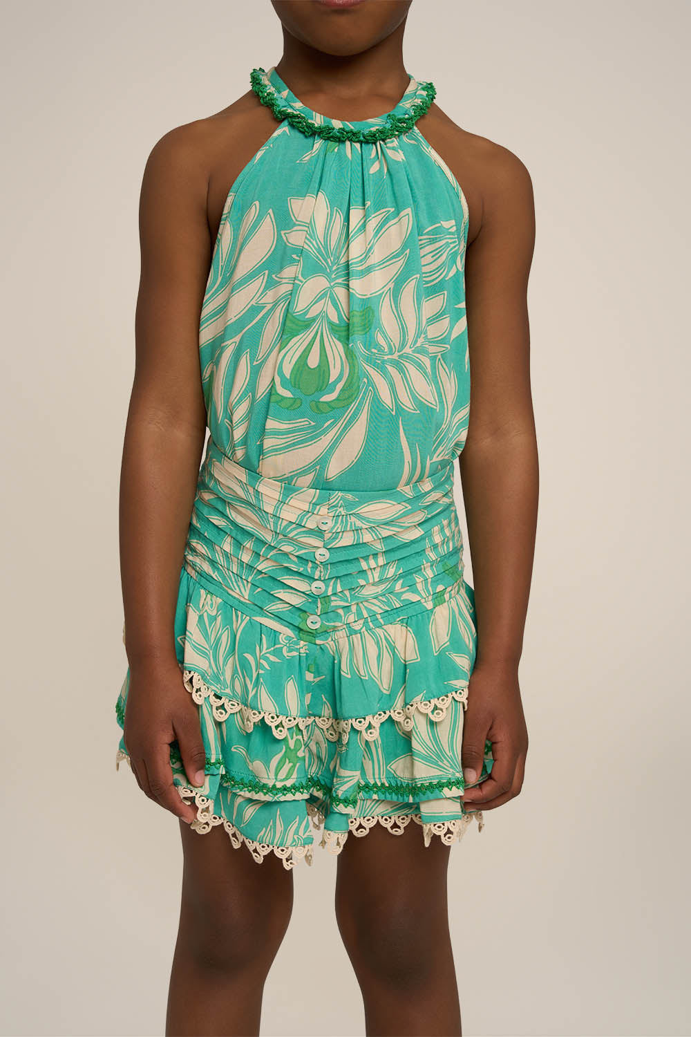 Pink mini skirt for girls by Poupette St Barth, featuring aqua Kerylos pattern and a stylish, comfortable fit.