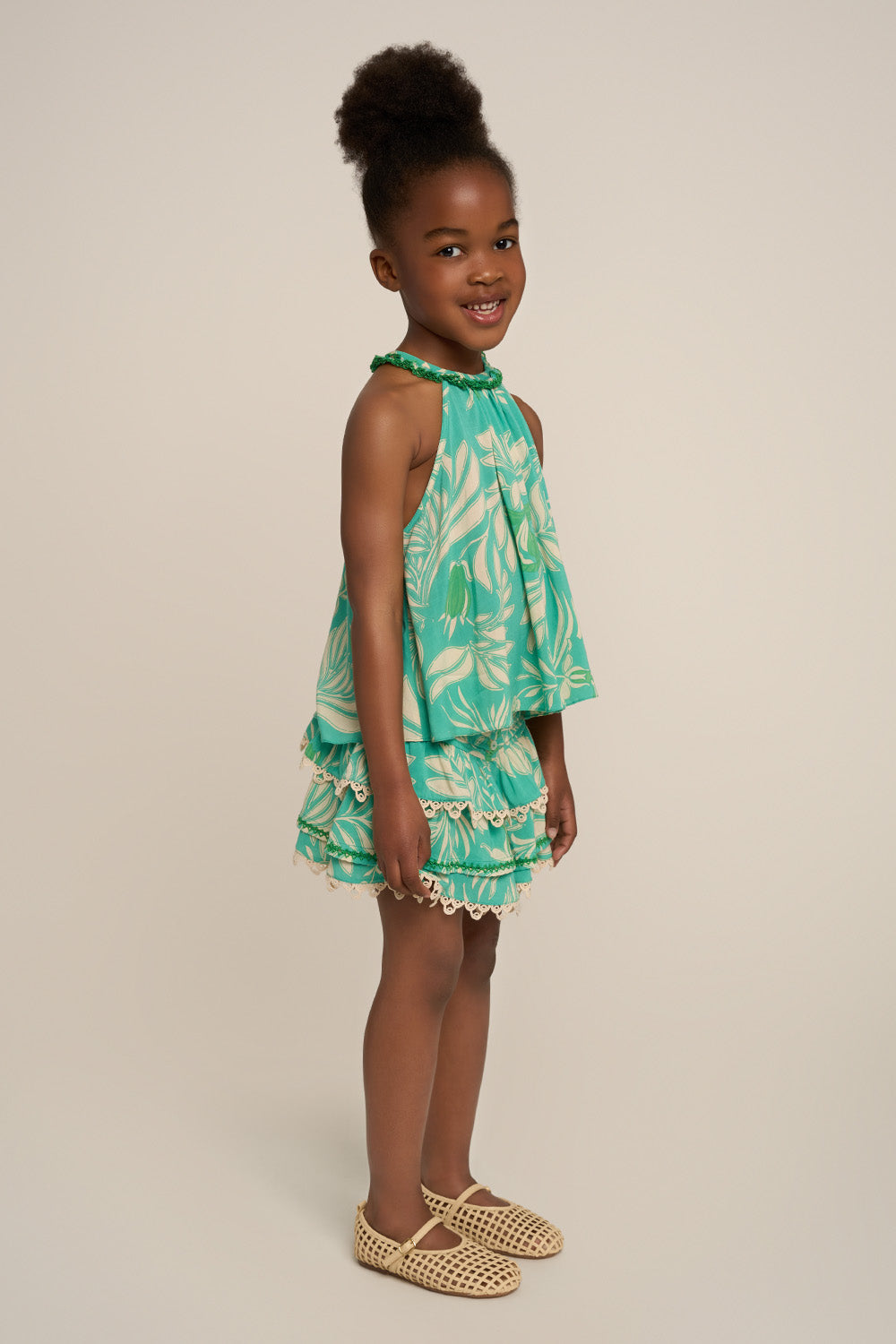 Poupette St Barth girls' Aqua Kerylos Top Cleo featuring a stylish design, shown from the side with vibrant aqua color.