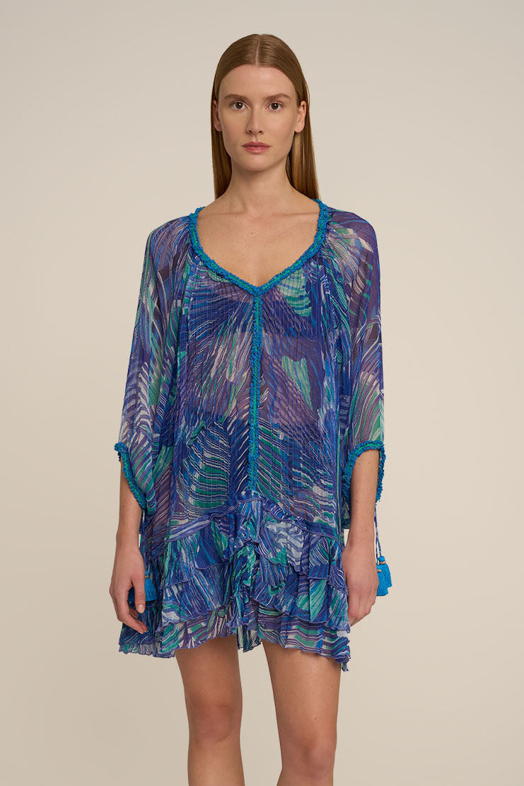 Blue Nava Poncho by Poupette St Barth, featuring a stylish design with a relaxed fit and vibrant color, shown from the front.