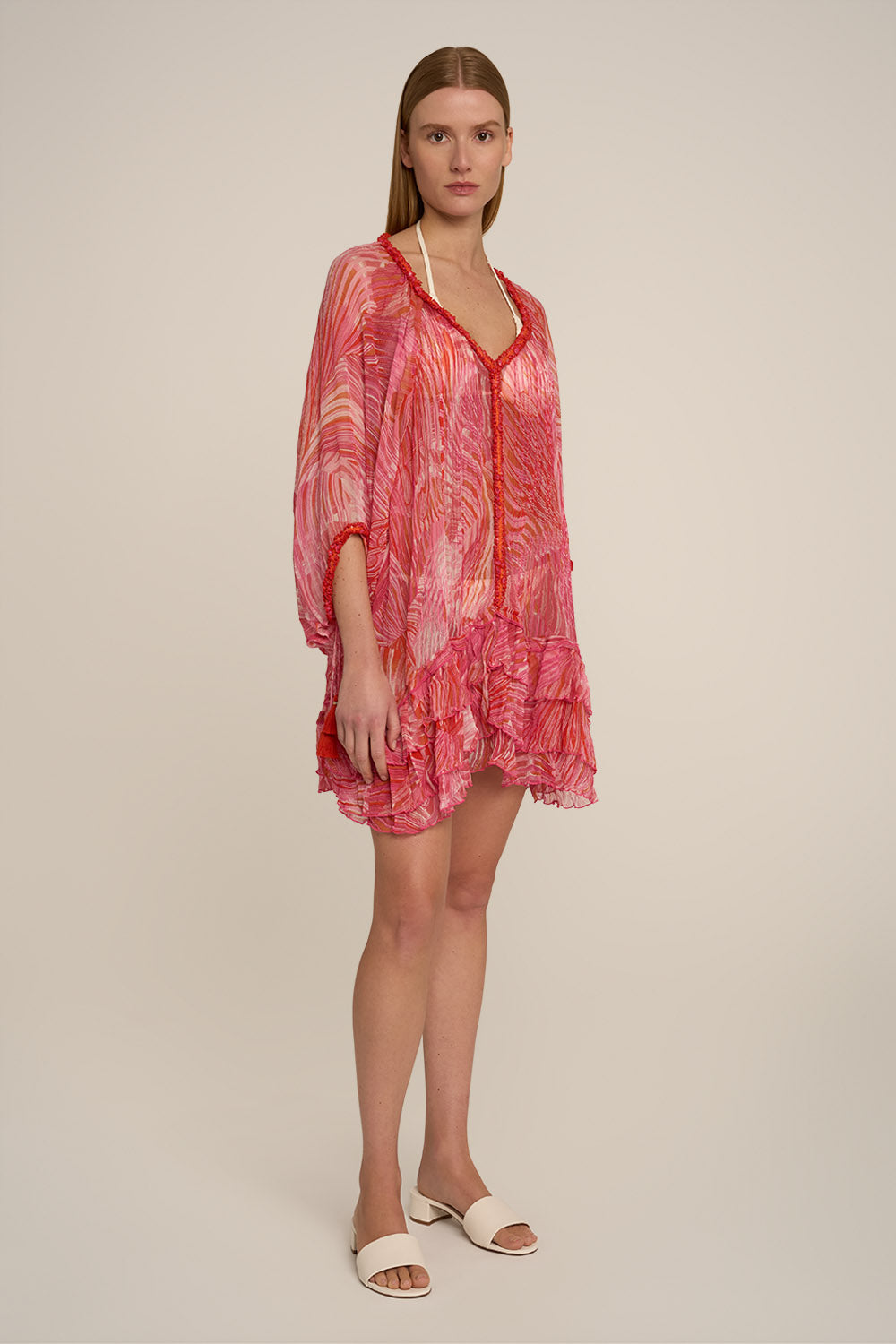 Pink Nava Poncho by Poupette St Barth, featuring a stylish and comfortable design with intricate details.