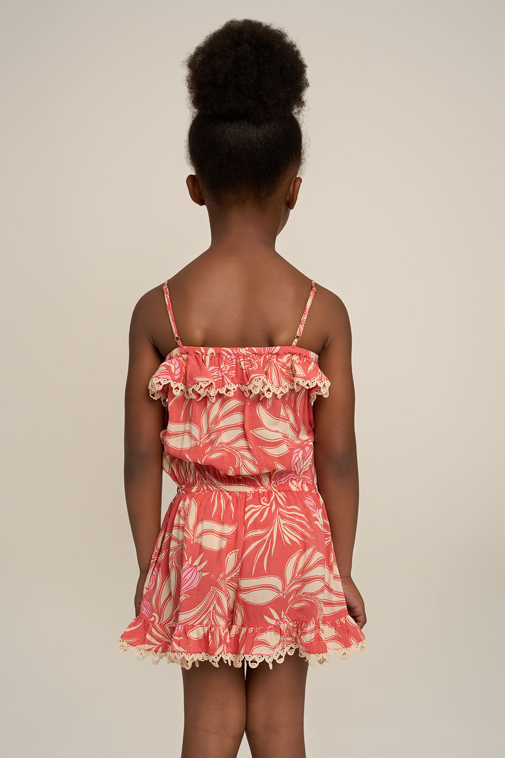 Pink short jumpsuit for girls featuring angel design by Poupette St Barth, made of soft, comfortable fabric.