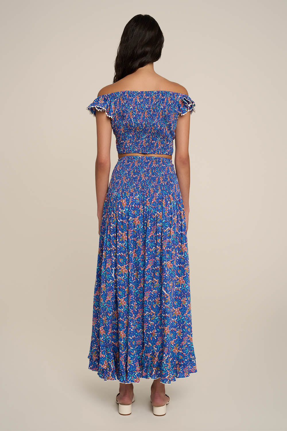 Blue Tiny Blooms long skirt – Long Skirt Neree by Poupette St Barth, back view, worn with the matching Top Bella