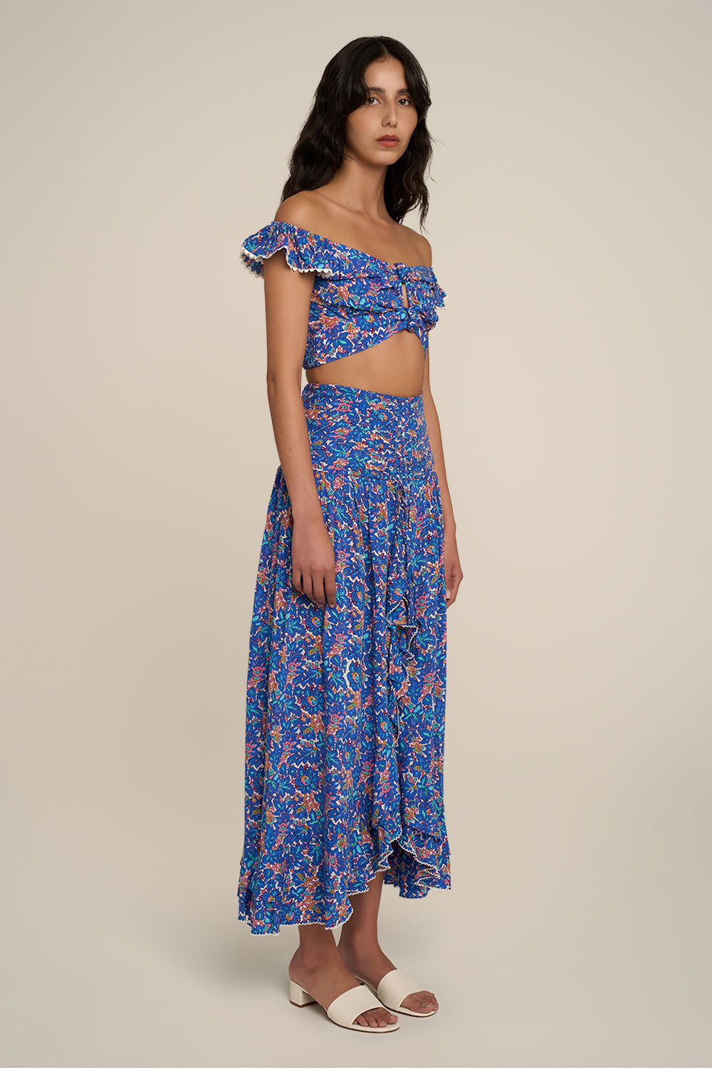 Blue Tiny Blooms long skirt – Long Skirt Neree by Poupette St Barth, side view, worn with the matching Top Bella