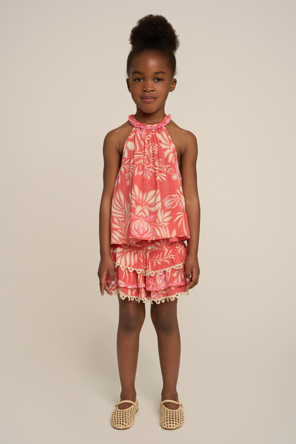 Pink Cleo top for girls by Poupette St Barth, featuring a stylish design with a front view of the pink shirt.