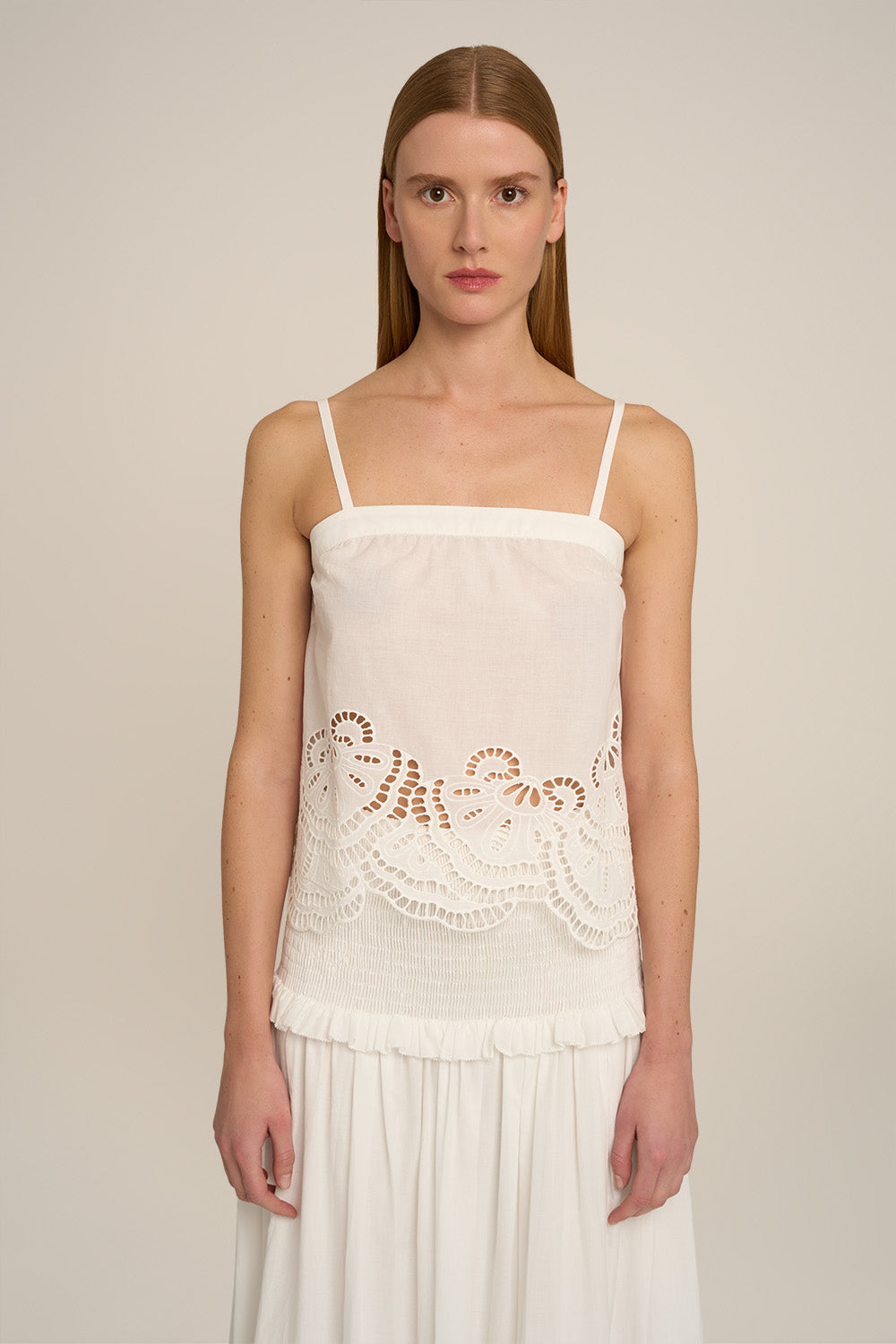 Poupette St Barth Top Daphne in natural white, plain sleeveless design, shown from the front with a long skirt.