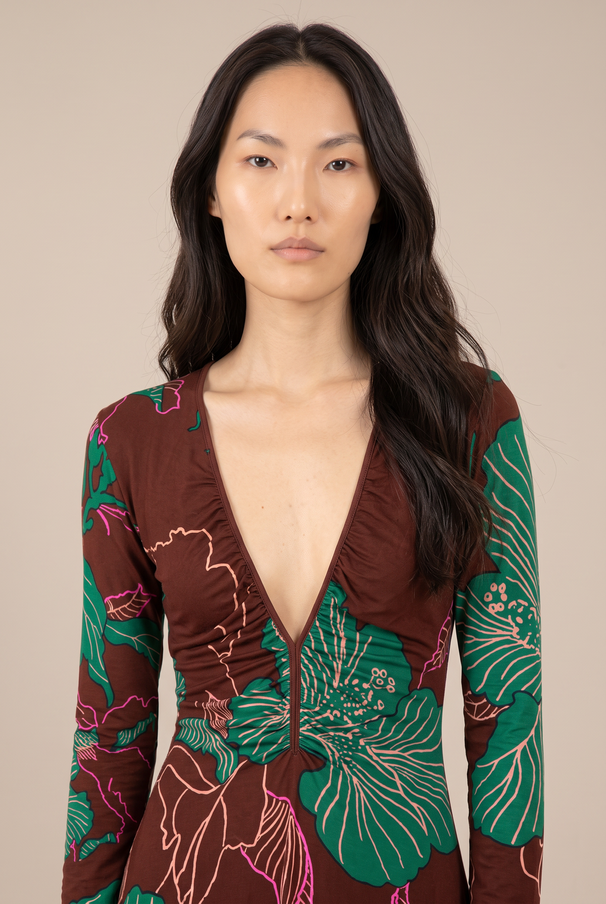 Brown hibiscus print long dress by Poupette St Barth featuring flowing fabric and elegant design.