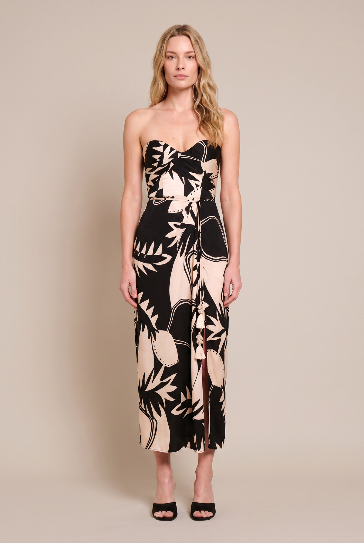 Black Oasis long dress – Long Dress Collina by Poupette St Barth, front view with sweetheart neckline and tassel tie