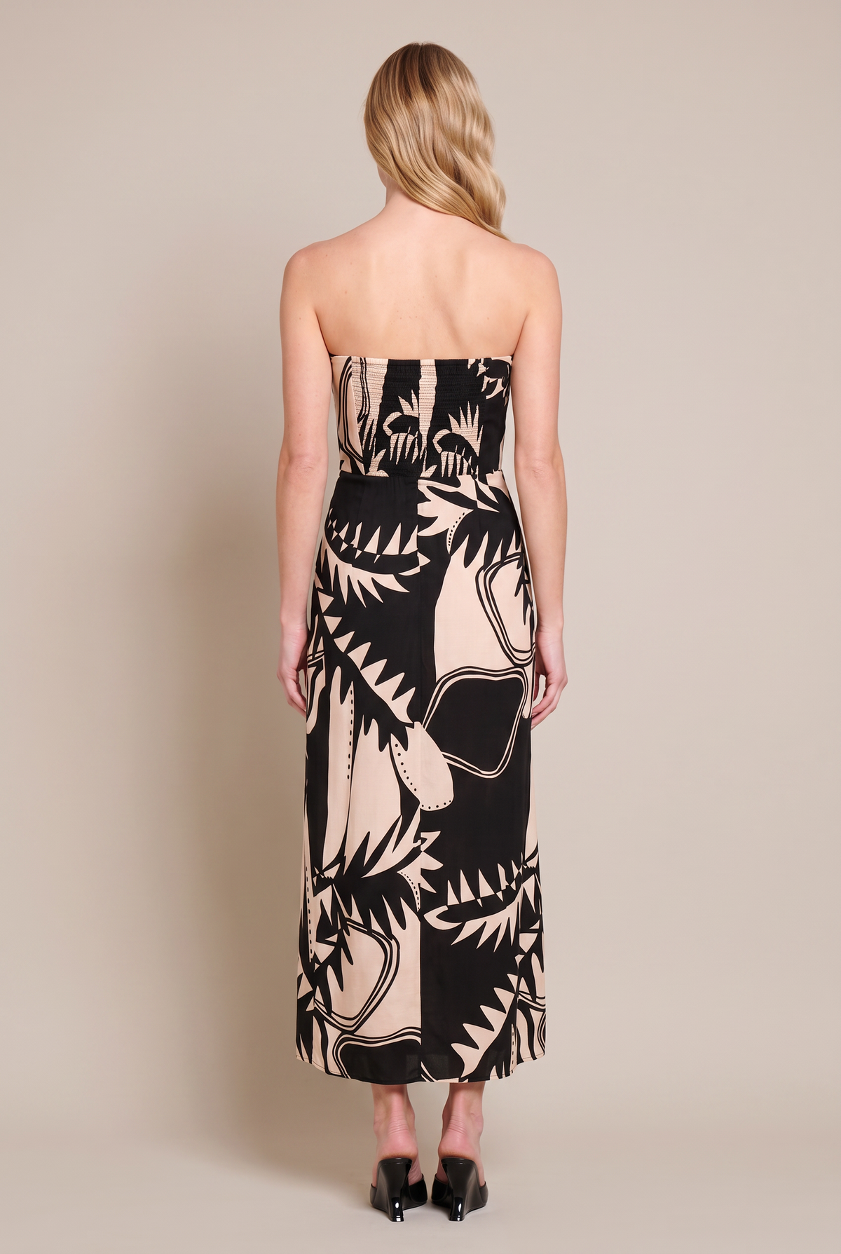 Black Oasis long dress – Long Dress Collina by Poupette St Barth, full-length back view with smocked panel