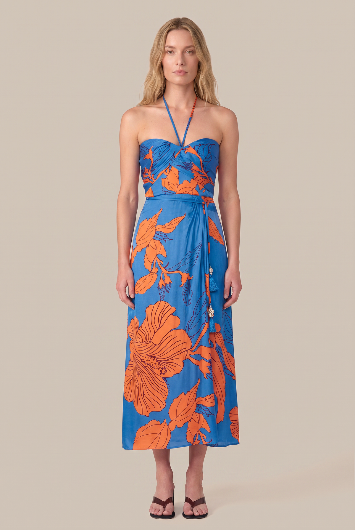 Poupette St Barth Long Dress Collina in Blue Hibiscus with flowing fabric and floral pattern, perfect for summer or beach wear.