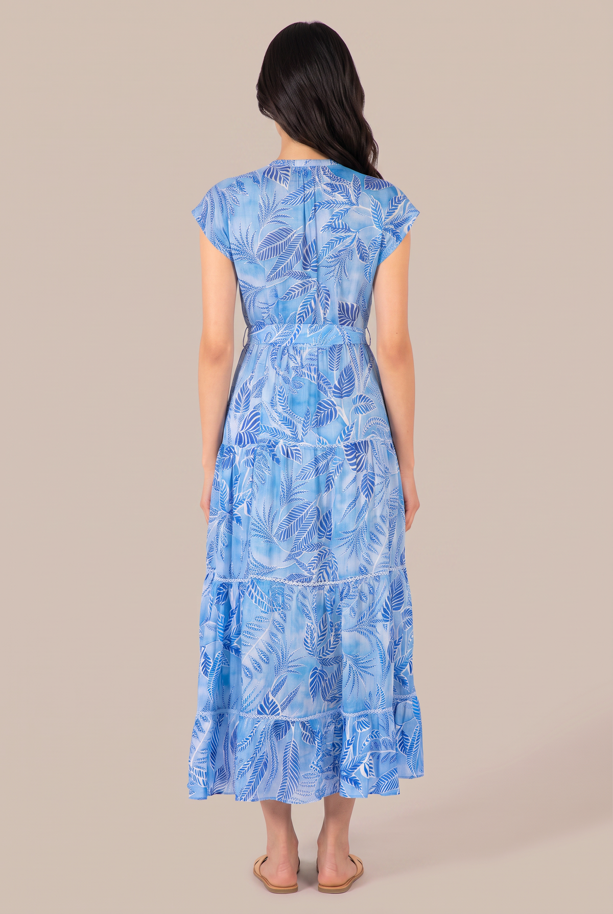 Blue Calathea long dress by Poupette St Barth featuring flowing fabric and elegant design for warm-weather occasions.