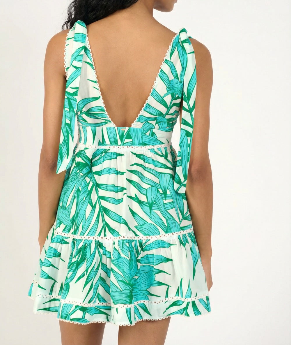 Green palm leaf cotton mini dress by Poupette St Barth, featuring a stylish short dress with tropical print.