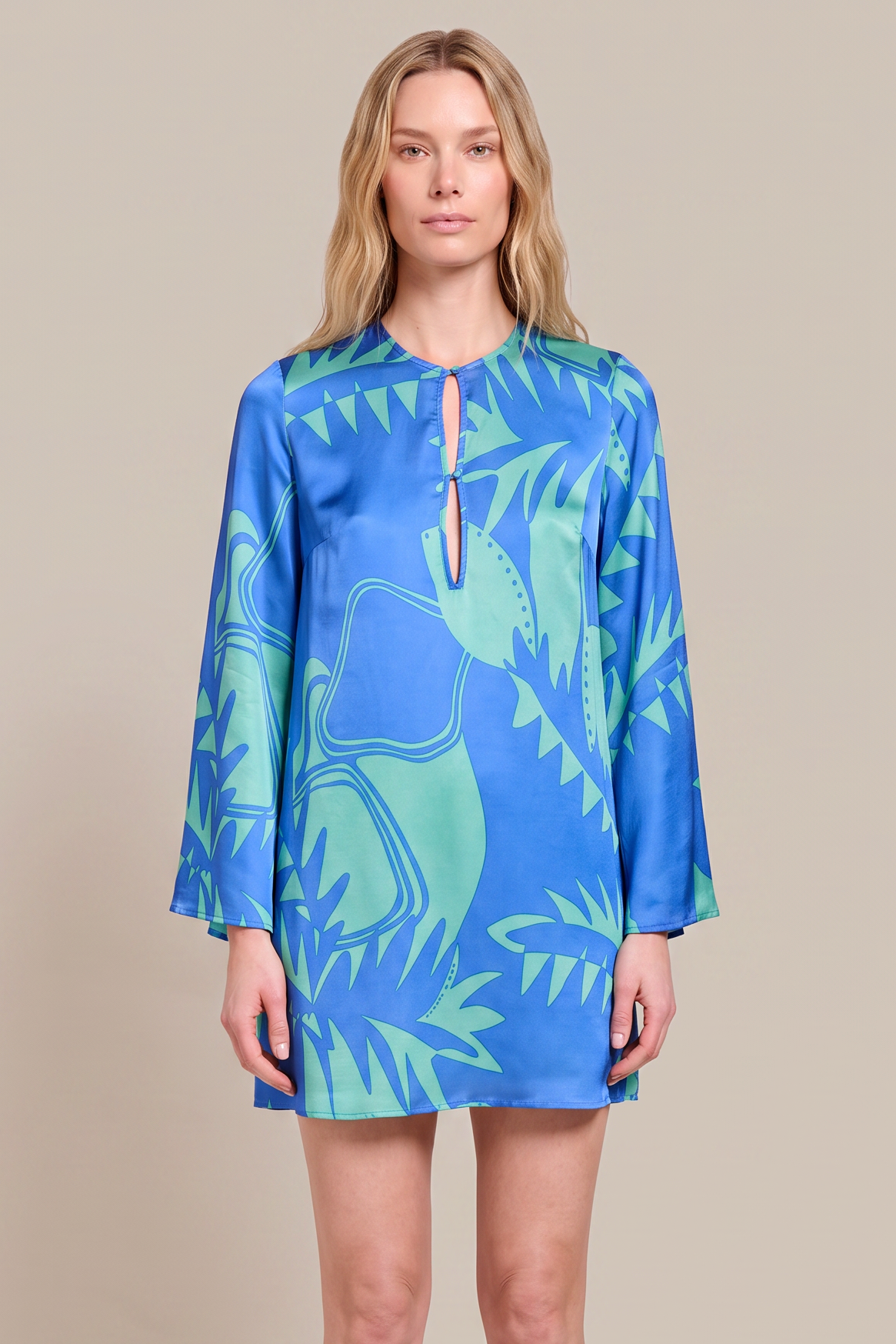 Blue Oasis Mini Dress Gia by Poupette St Barth, sleeveless mini dress with a flowy silhouette and vibrant blue floral pattern.