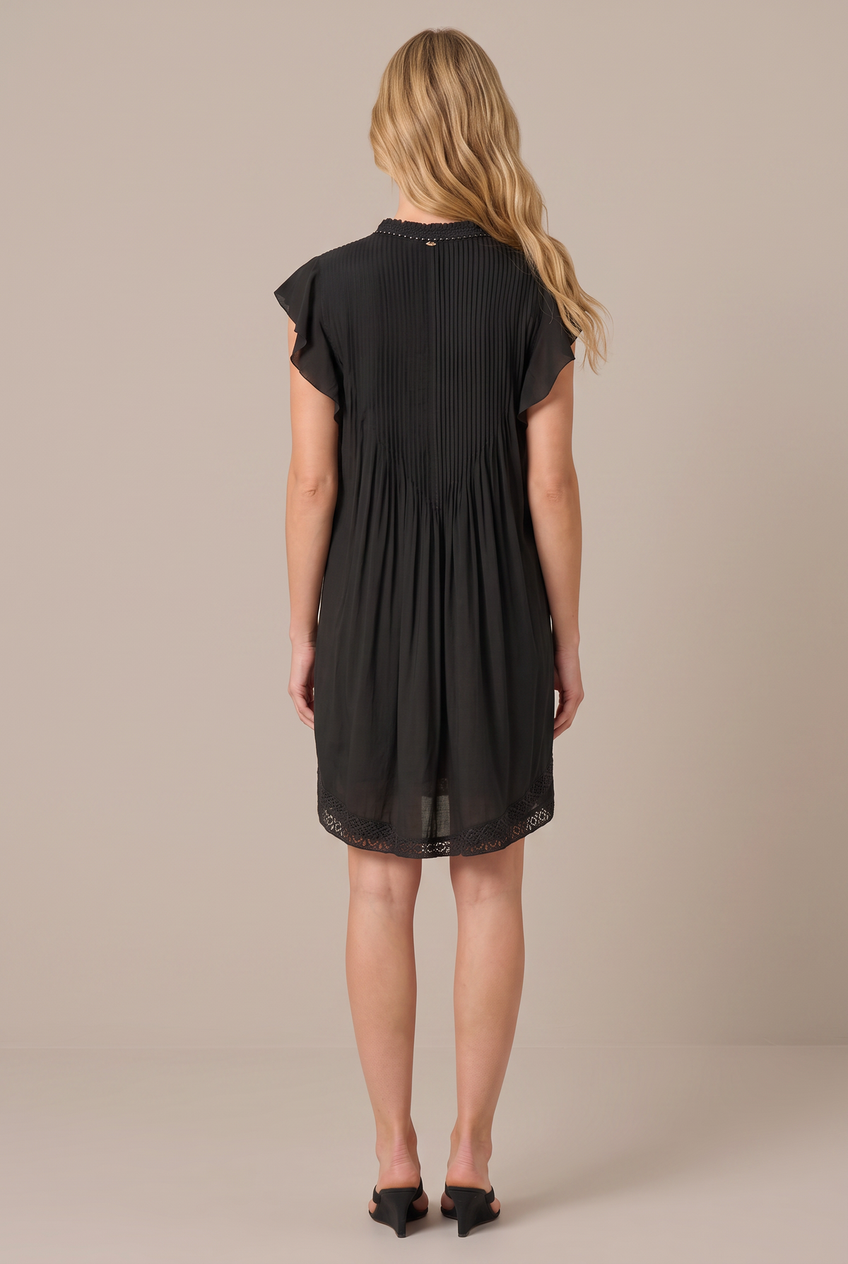 Black Mini Dress Sasha by Poupette St Barth, stylish sleeveless mini dress with a fitted silhouette and elegant design.