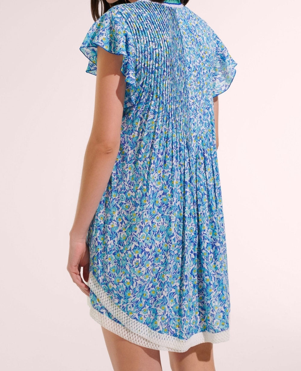 Poupette St Barth Mini Dress Sasha in blue ocean flower print, lightweight viscose fabric, fitted style, perfect for summer wear.