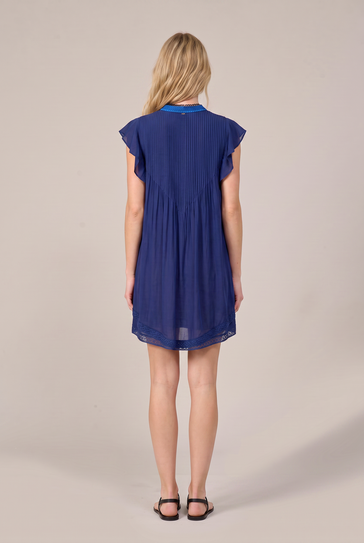 Navy mini dress by Poupette St Barth featuring a fitted silhouette and stylish design, perfect for casual or semi-formal occasions.
