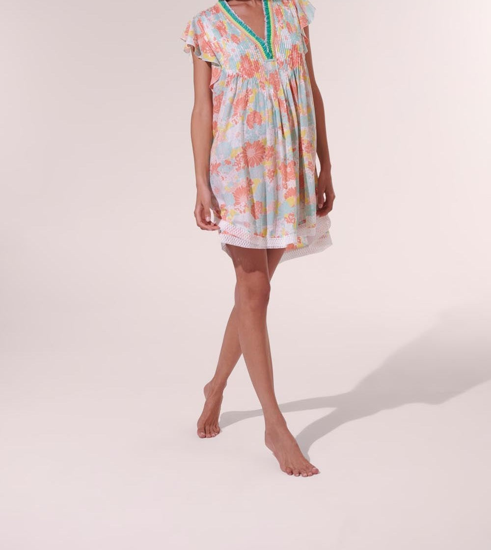 Poupette St Barth Mini Dress Sasha in orange flower print, lightweight viscose fabric, featuring a stylish mini dress design.