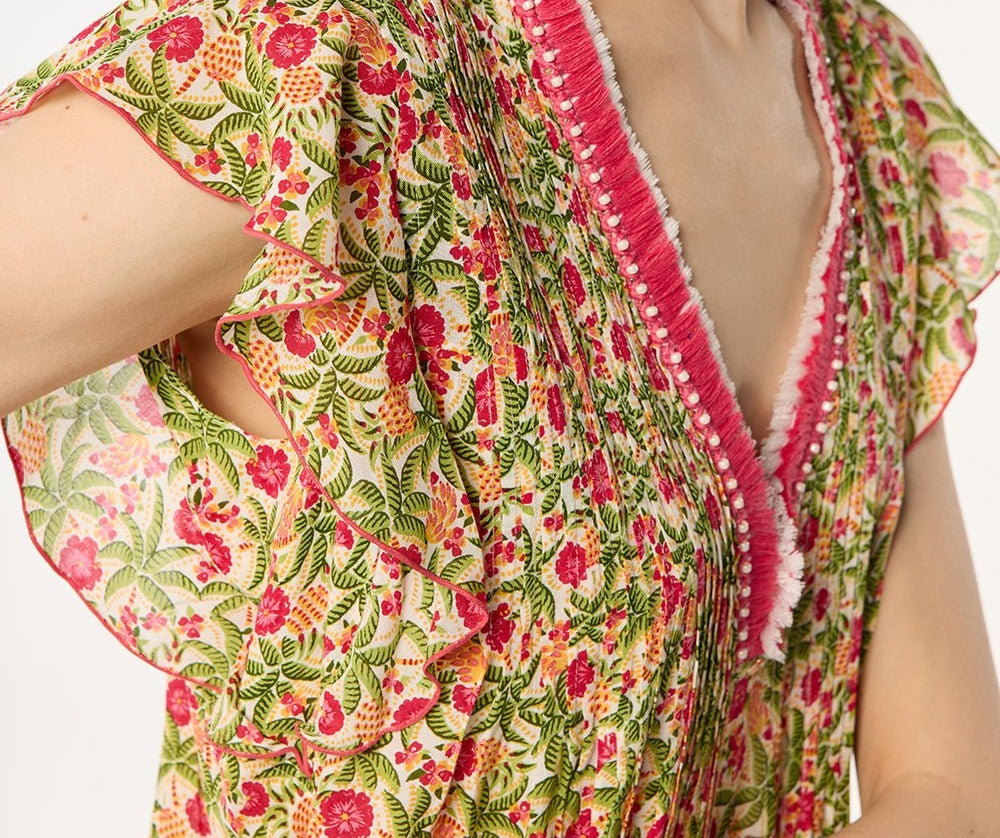 Pink viscose Mini Dress Sasha by Poupette St Barth, showing a stylish mini dress with a vibrant pink Honolulu pattern.