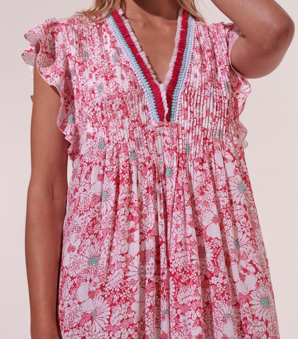Pink Mini Dress Sasha by Poupette St Barth featuring a mid-70s garden-inspired floral print and lightweight viscose fabric.