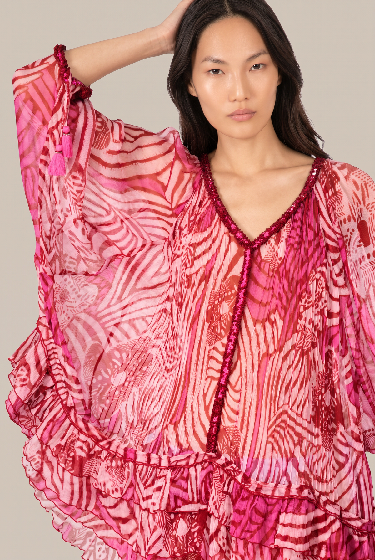 Pink Japonism poncho – Poncho Nava by Poupette St Barth, close-up of the beaded V-neckline