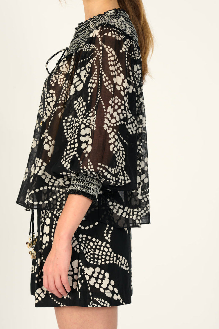 Black Ysee blouse by Poupette St Barth, made of cotton gauze, featuring a relaxed fit and casual style.