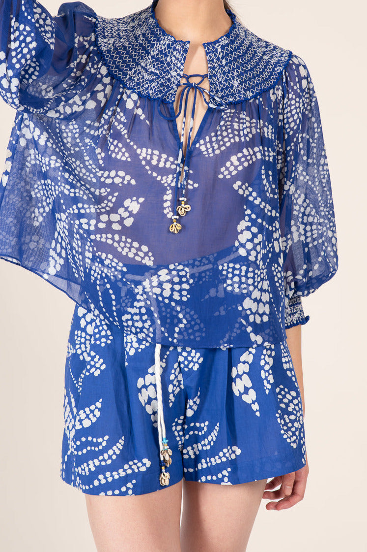 Blue Austral blouse – Blouse Ysee by Poupette St Barth, front view of sheer blouse with smocked collar