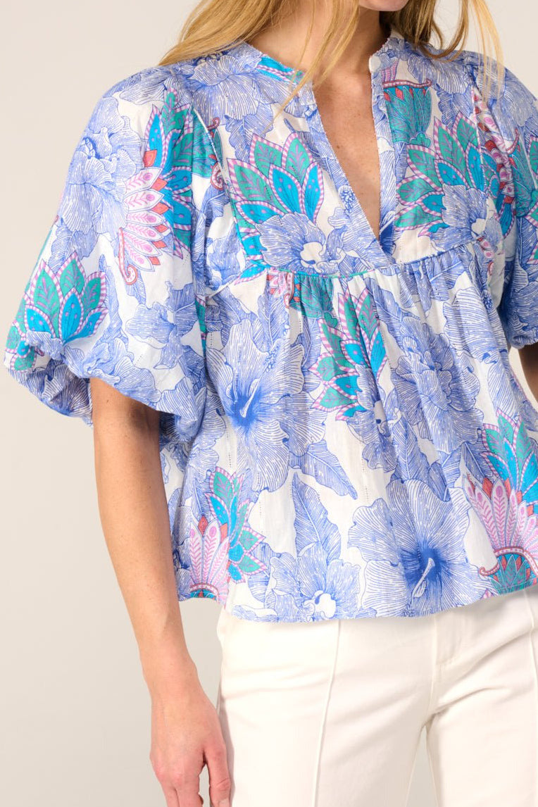Blue Padang cotton eyelet stripe blouse from Poupette St Barth featuring floral embroidery and a relaxed fit.