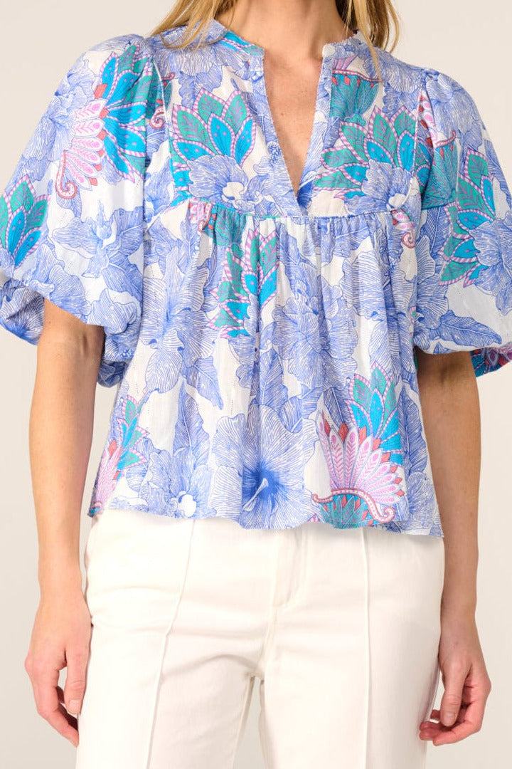 Blue Padang cotton eyelet stripe blouse from Poupette St Barth, featuring a feminine floral design and lightweight fabric.