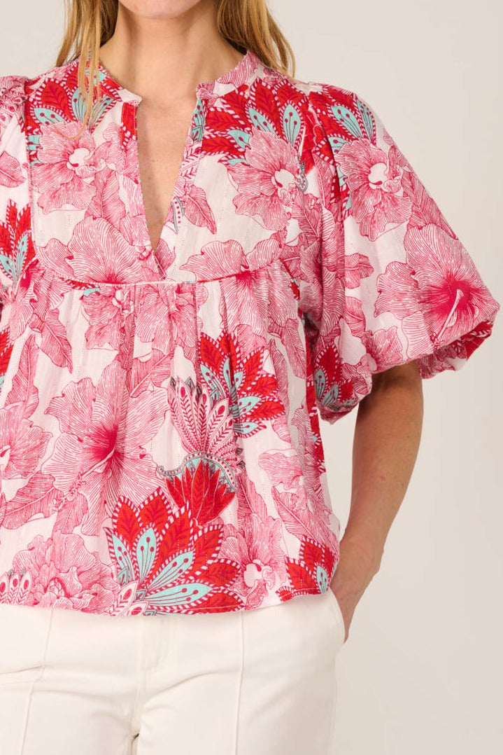 Pink Padang blouse – Blouse Flores by Poupette St Barth, front view with split neckline and puff sleeves