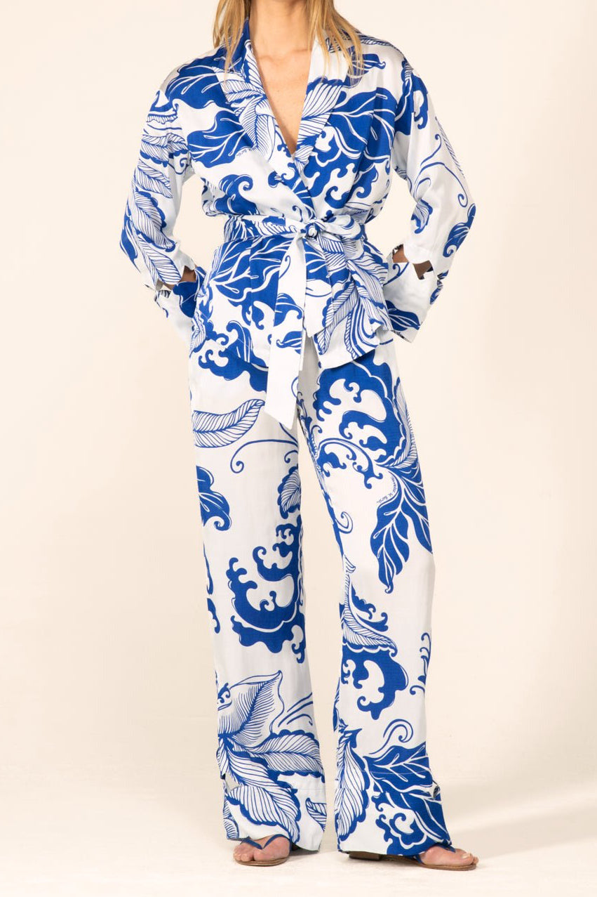 Poupette St Barth Blue Reef Wave Jacket June cover-up in viscose satin, lightweight blue with wave pattern, cropped fit.