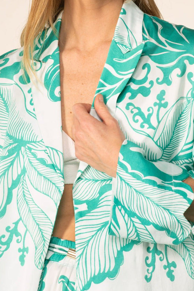 Poupette St Barth June Green Reef Wave cover-up jacket in silky viscose satin, with a relaxed fit and vibrant green reef pattern.