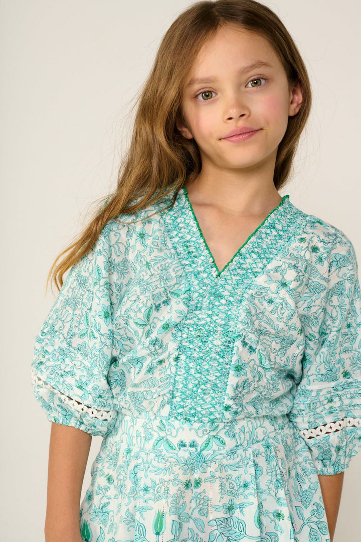 Girls' aqua short jumpsuit by Poupette St Barth, featuring a stylish design with short sleeves and a comfortable fit.